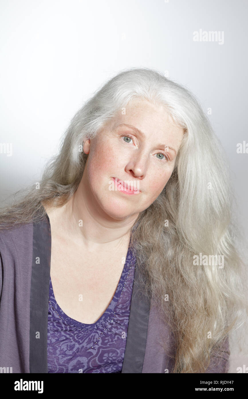 Mature woman curly hair beauty hi-res stock photography and images - Alamy