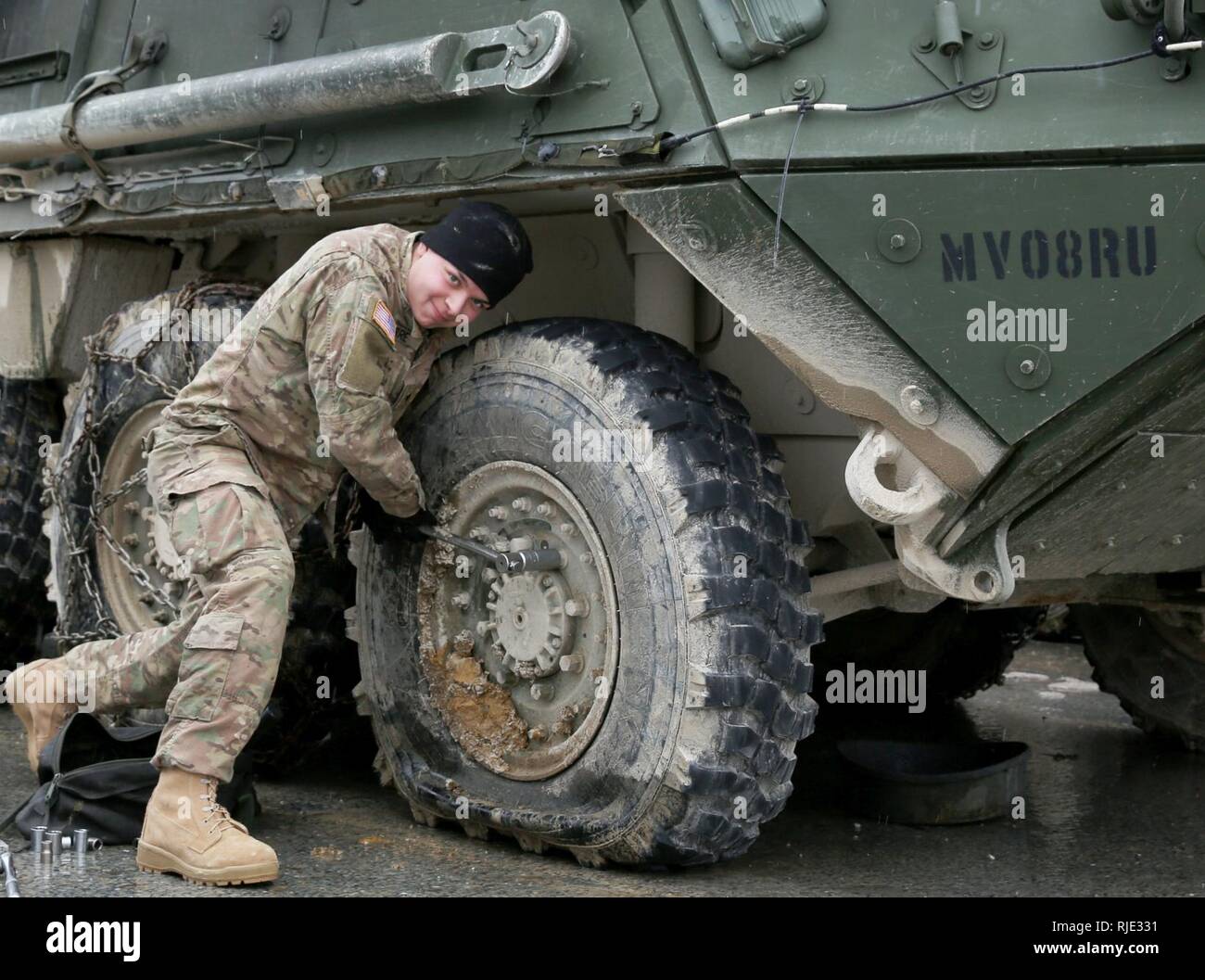 A U.S. Army Soldier from 2nd Squadron, 2nd Cavalry Regiment (2CR) performs maintenance measures on an M1126 Stryker Infantry Carrier Vehicle during Allied Spirit VIII in the Hohenfels Training Area, Hohenfels, Germany, Jan. 20, 2018. Allied Spirit VIII includes approximately 4,100 participants from 10 nations at 7th Army Training Command's Hohenfels training Area, Jan. 15-Feb. 5, 2018. Allied Spirit is a U.S. Army Europe-directed multinational exercise series designed to develop and enhance NATO and key partner's interoperability and readiness. Stock Photo