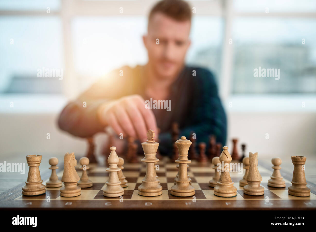 Businessman play with chess game. concept of business strategy and tactic Stock Photo