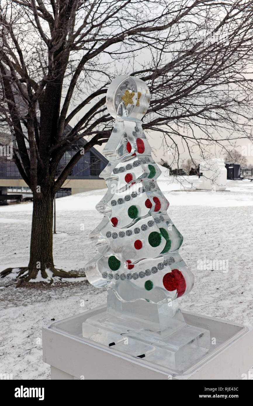 An ice sculpture of a Christmas tree stands on the snow-covered Cleveland, Ohio lakefront. Stock Photo