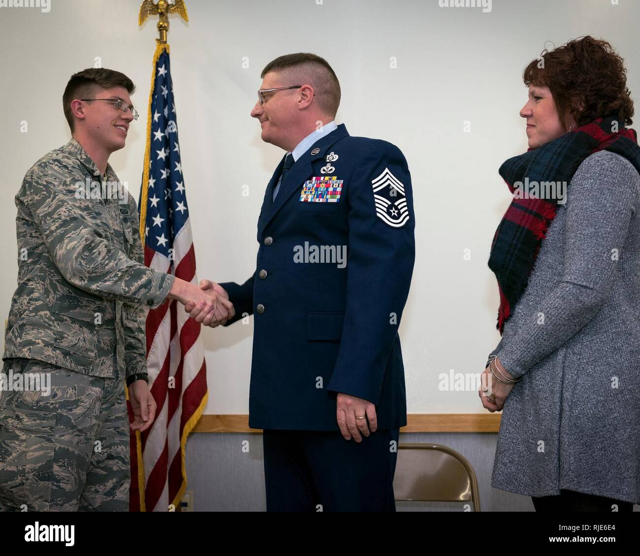 U.S. Air Force Chief Master Sgt. Timothy Foley, center, an emergency ...