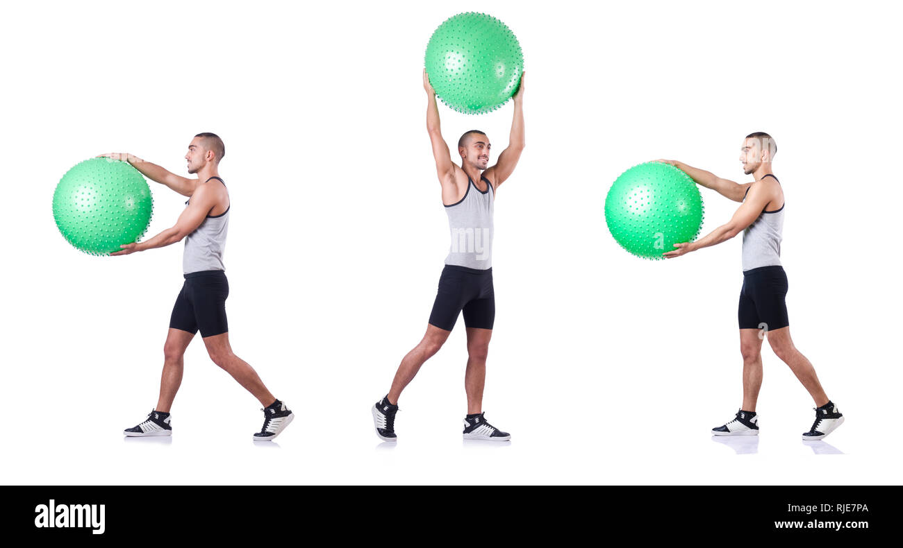 Man with swiss ball doing exercises on white Stock Photo - Alamy