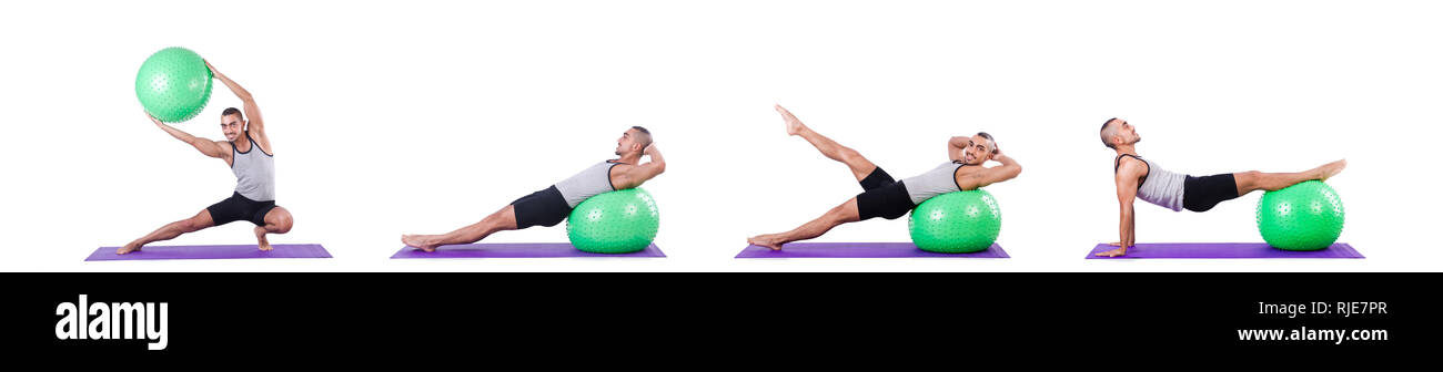 Man with swiss ball doing exercises on white Stock Photo - Alamy