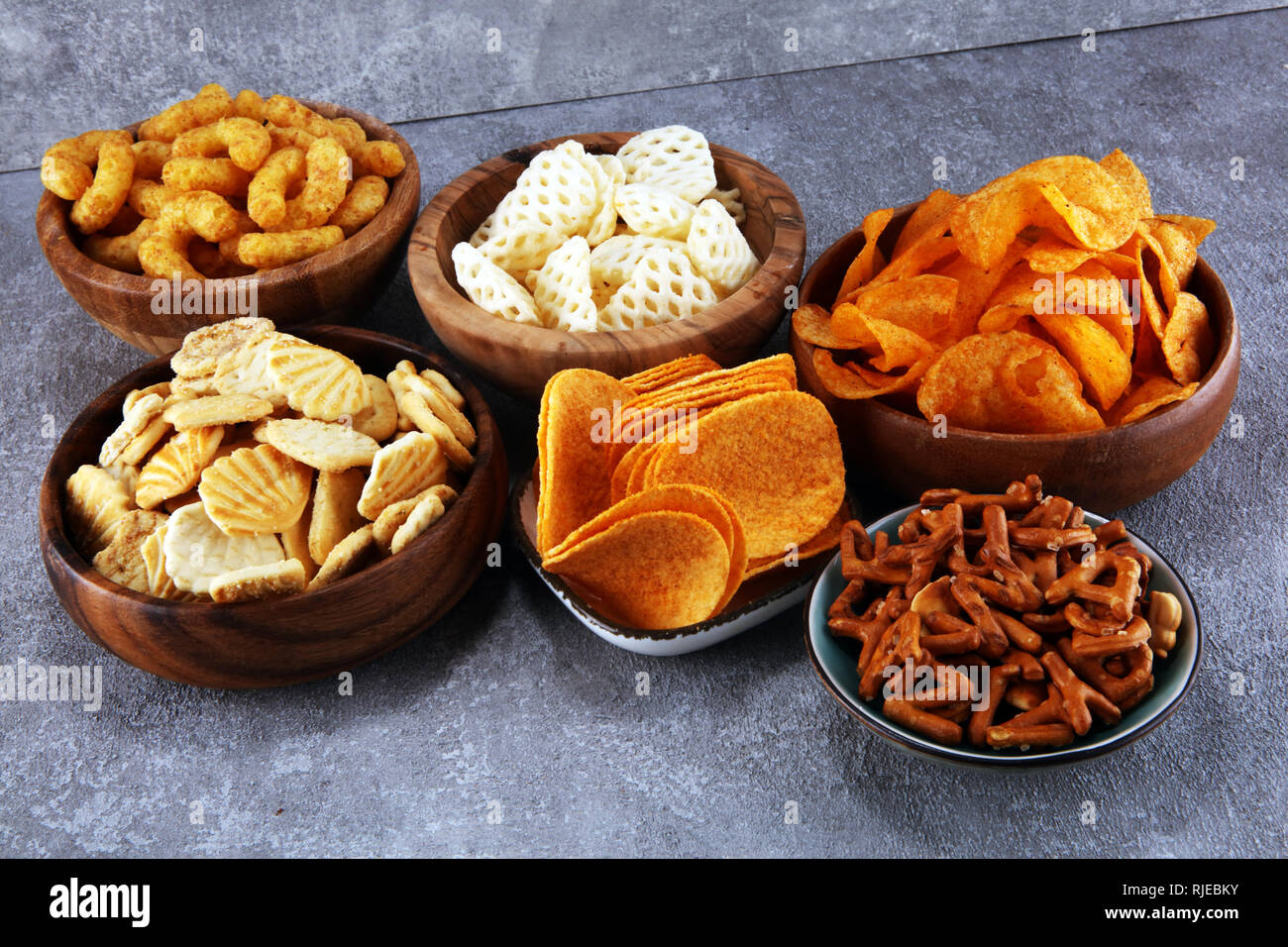 Cheese Ball Bonanza Powdery orange salty snack goodness. Yummy snack. Junk  food. Treat. Delicious background. Throwback food. Stock Photo