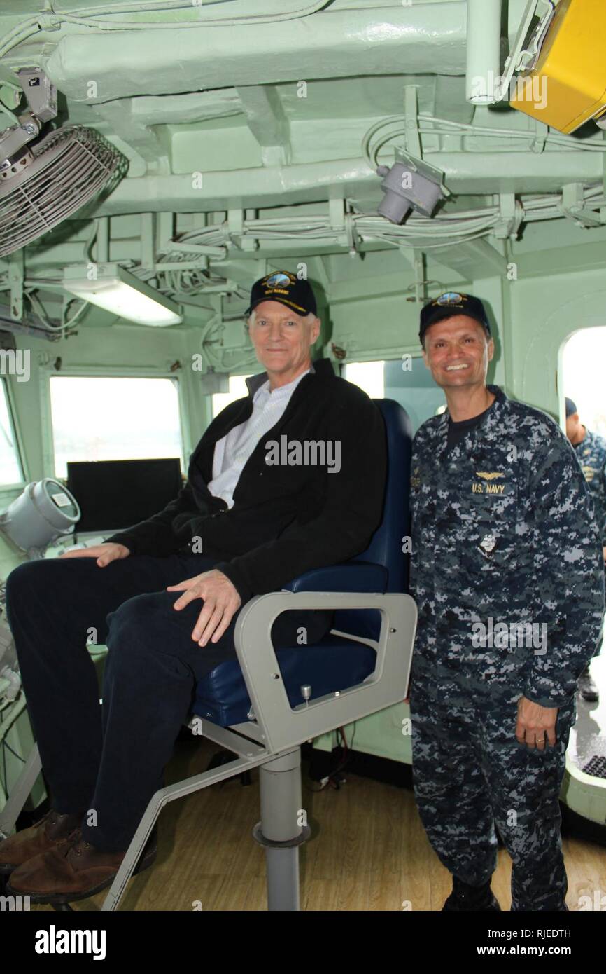 AUGUSTA BAY, Italy (Dec. 9th, 2016) Director, Defense Logistics Agency, Lt. Gen Andrew E. Busch, left, on the bridge of the U.S. 6th Fleet Command and Control ship USS Mount Whitney (LCC 20) with the ship’s Commanding Officer, Capt. Kavon Hakimzadeh Dec. 9, 2016.  During the visit Busch discussed logistical challenges in support of  Mount Whitney’s mission in the European area of responsibility and the upcoming shipyard availability. U.S. 6th Fleet, headquartered in Naples, Italy, conducts the full spectrum of joint and naval operations, often in concert with allied, joint, and interagency par Stock Photo