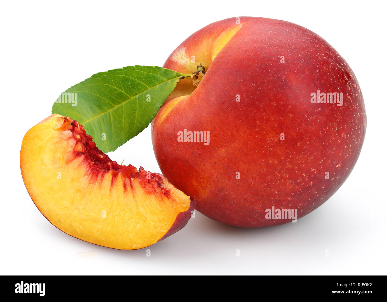 Nectarine peach with leaf isolated on white background Stock Photo Alamy
