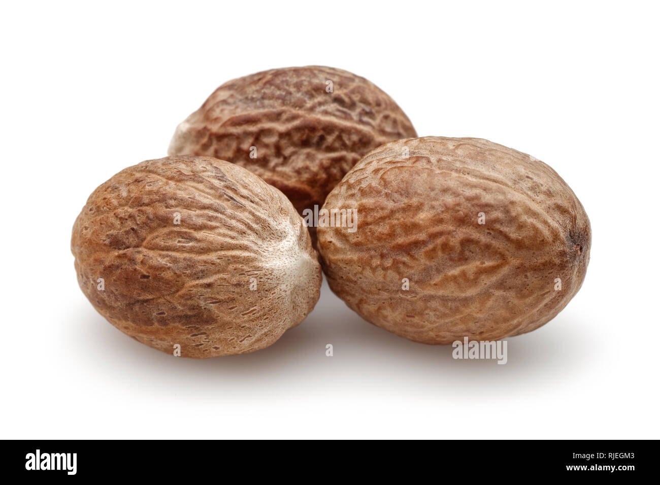 Group of nutmeg isolated on white background Stock Photo Alamy