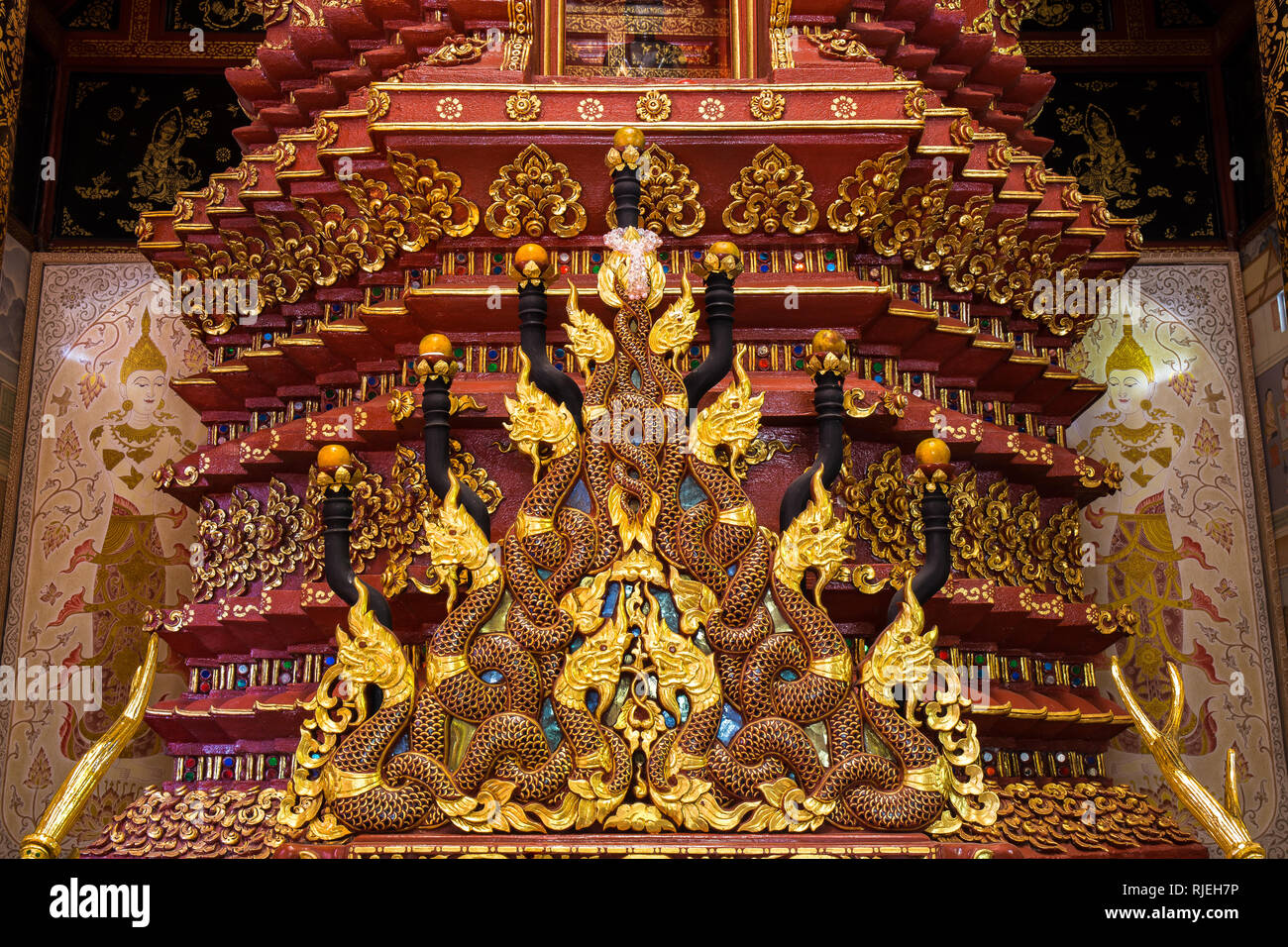 CHIANG RAI, THAILAND - JANUARY 5: Naga (the great serpent) art in front of Buddha altar on January 5, 2015 in Wat Phra Sing. Wat Phra Sing located in  Stock Photo