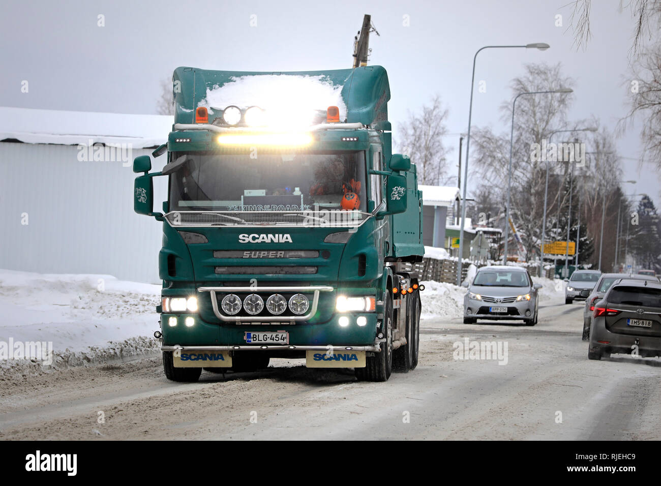 Salo, Finland - February 2, 2019: Customised green Scania P420 truck, high  beams and led light bar lit up briefly, hauls away snow cleared from city  Stock Photo - Alamy