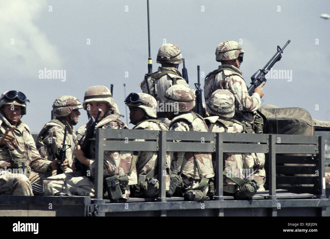 16th October 1993 Leaving UNOSOM Headquarters, U.S. Army infantry soldiers of C Company 1/87 head out onto the streets of Mogadishu, Somalia in the back of an M35 truck. Stock Photo