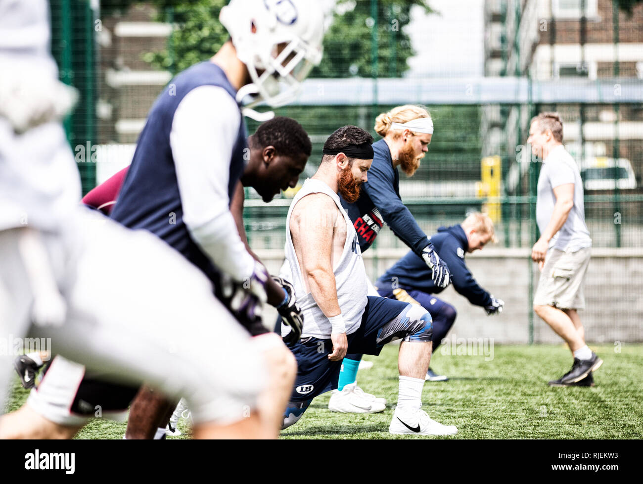 Uk American Football training as a team Stock Photo Alamy