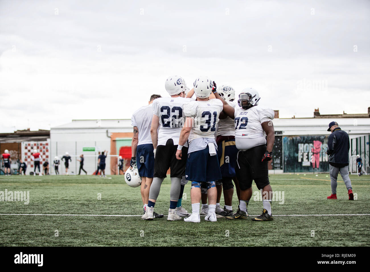 Uk American Football training as a team Stock Photo Alamy
