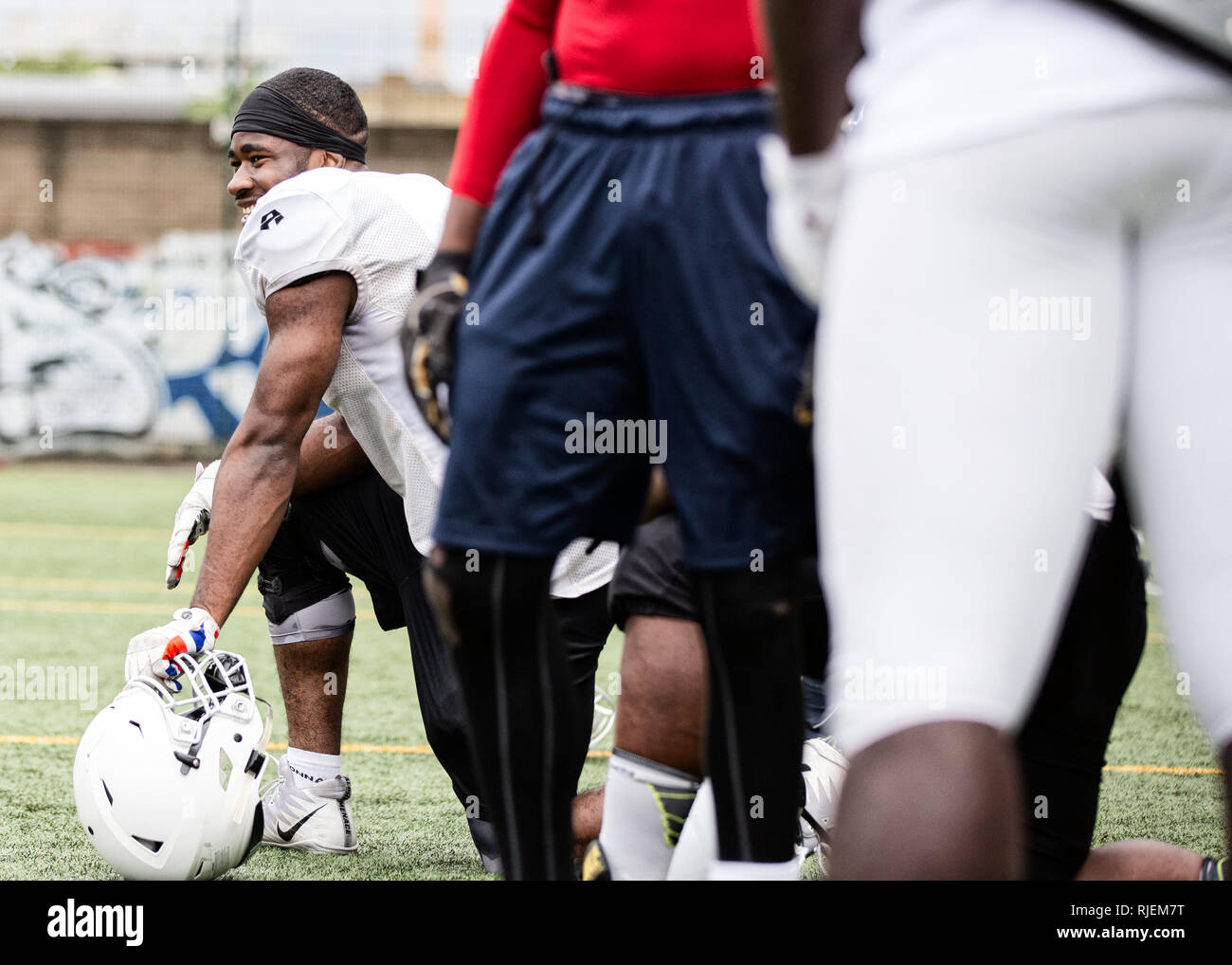 Uk American Football training as a team Stock Photo Alamy