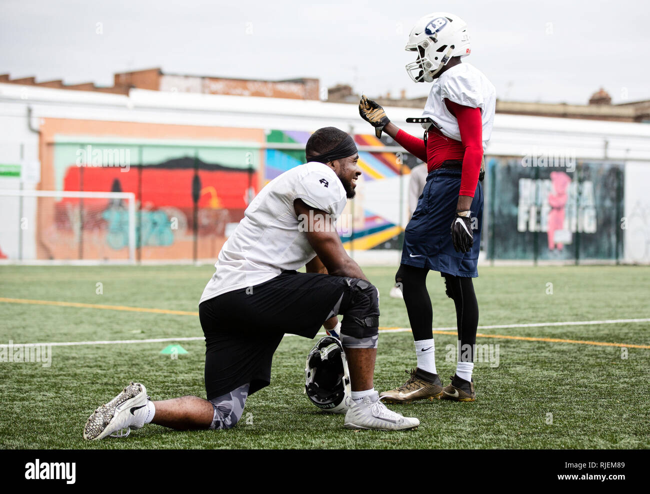 Uk American Football training as a team Stock Photo Alamy