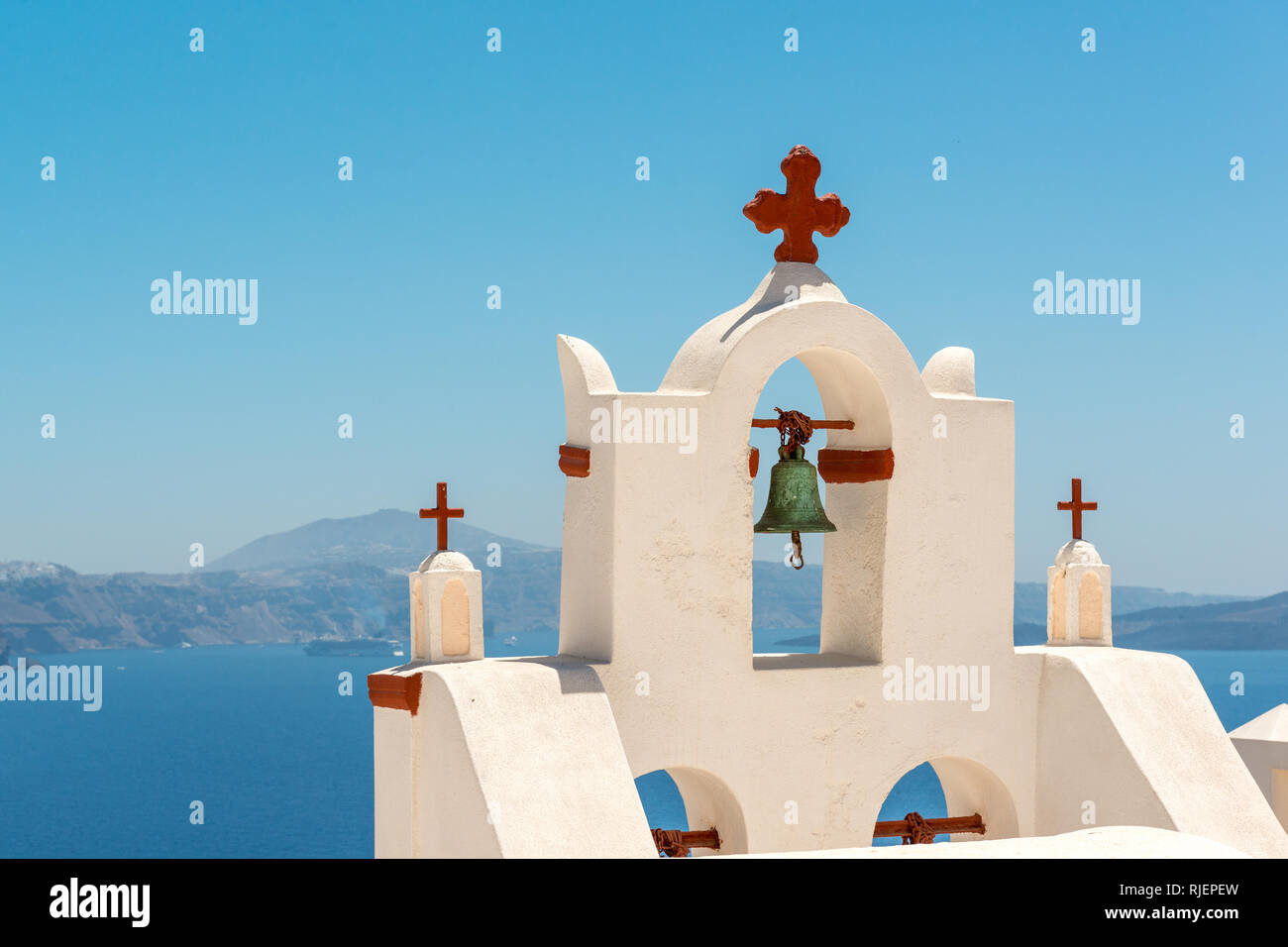 Bell tower of traditional Greek Orthodox church in Oia, Santorini Stock Photo
