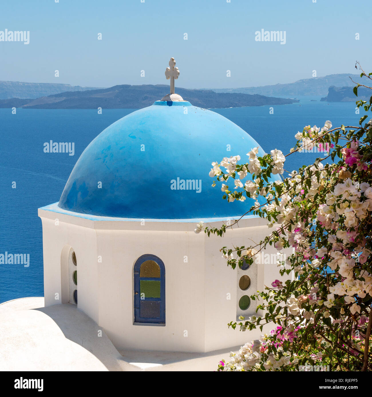 Blue dome of traditional Greek Orthodox church in Oia, Santorini Stock Photo