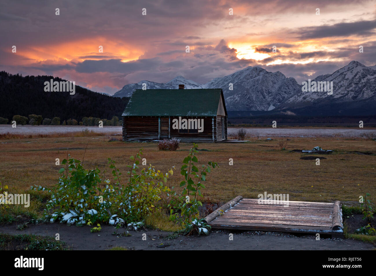 WY0321000...WYOMING Sunset on an out building of the Pink House, an