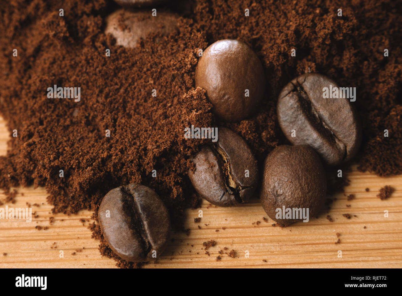 Close up photo of Coffee beans and ground coffee. Stock Photo