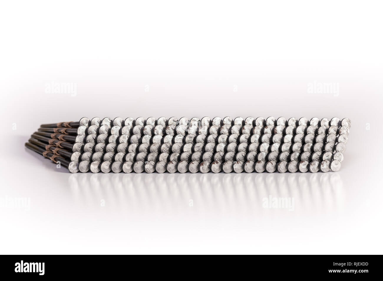 Nail gun nails used in a framing nail gun isolated on a white