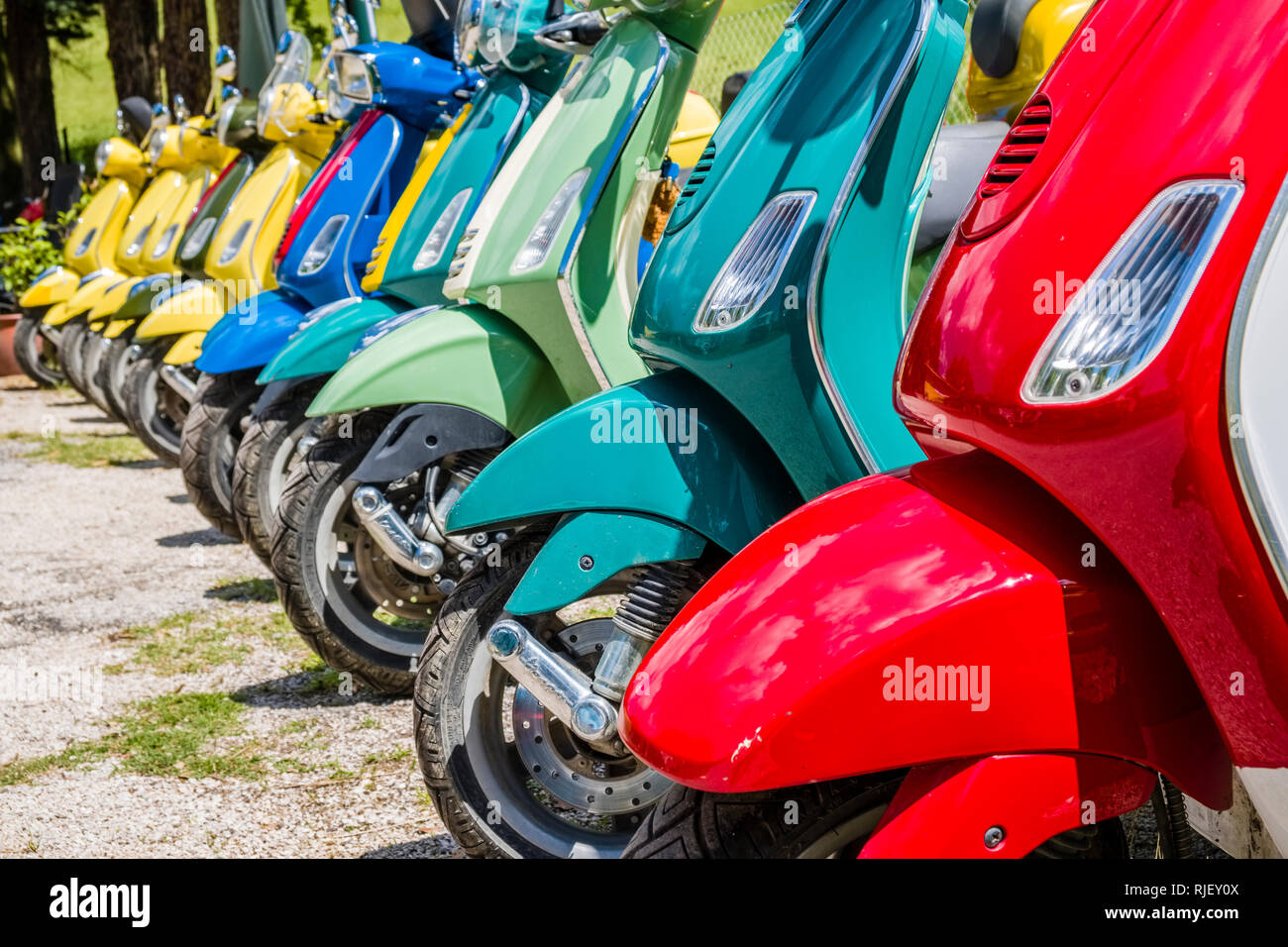 Colorful Vespa scooters in a row Stock Photo Alamy