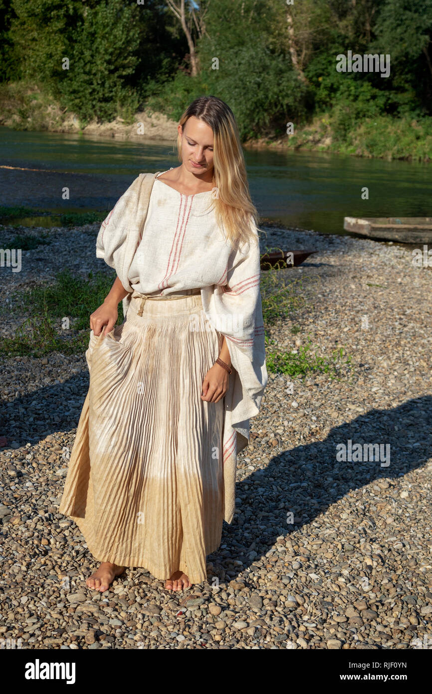 Girl in a traditional dress on the Drava River Stock Photo - Alamy