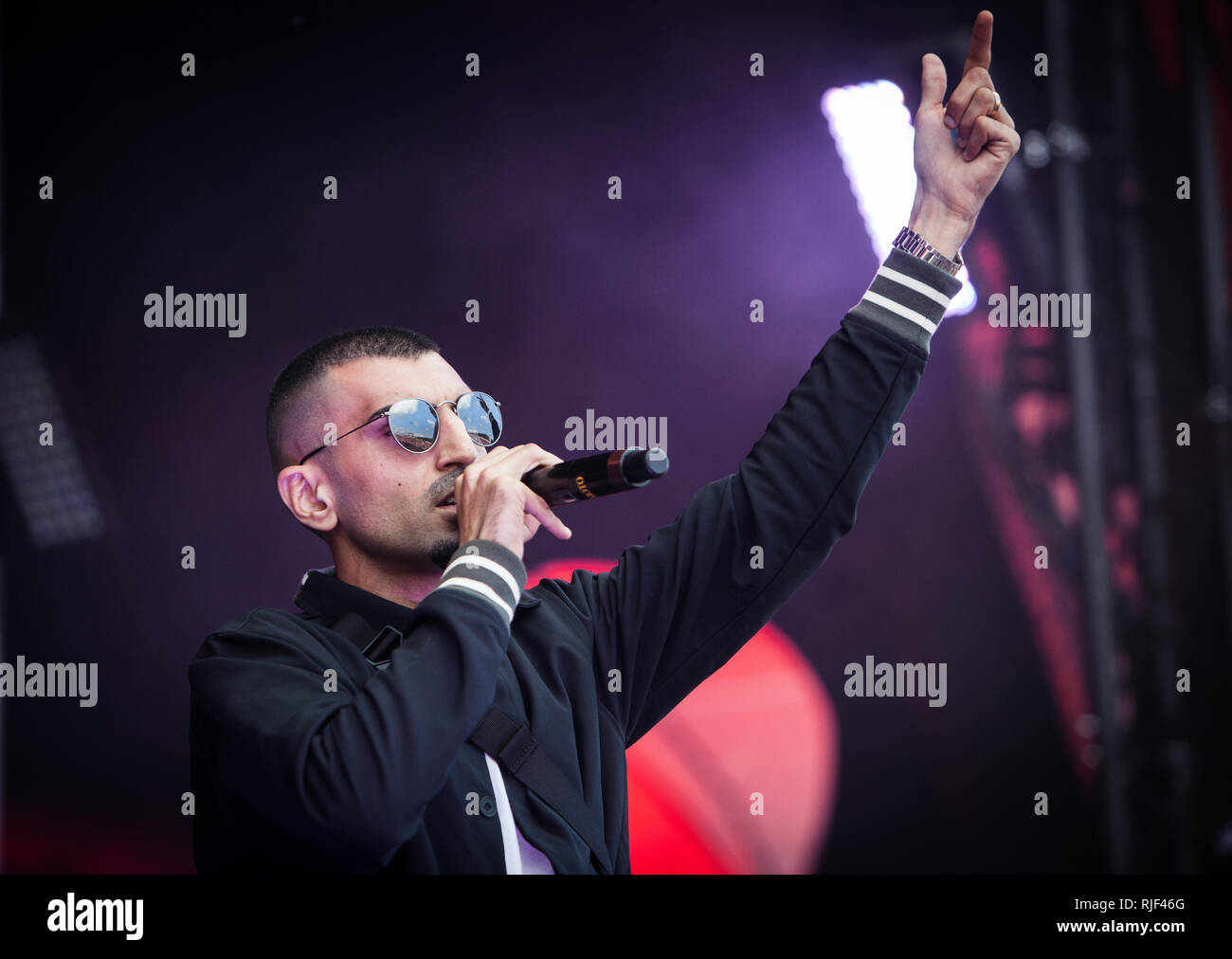 The Danish rapper Sivas (Stylized S!vas) performs a live concert at the Apollo Countdown stage at Roskilde Festival 2014. Sivas mess up the Danish dictionary combining Danish, English and Arabian in one big ghetto mixture. Denmark, 02/07 2014. EXCLUDING DENMARK. Stock Photo