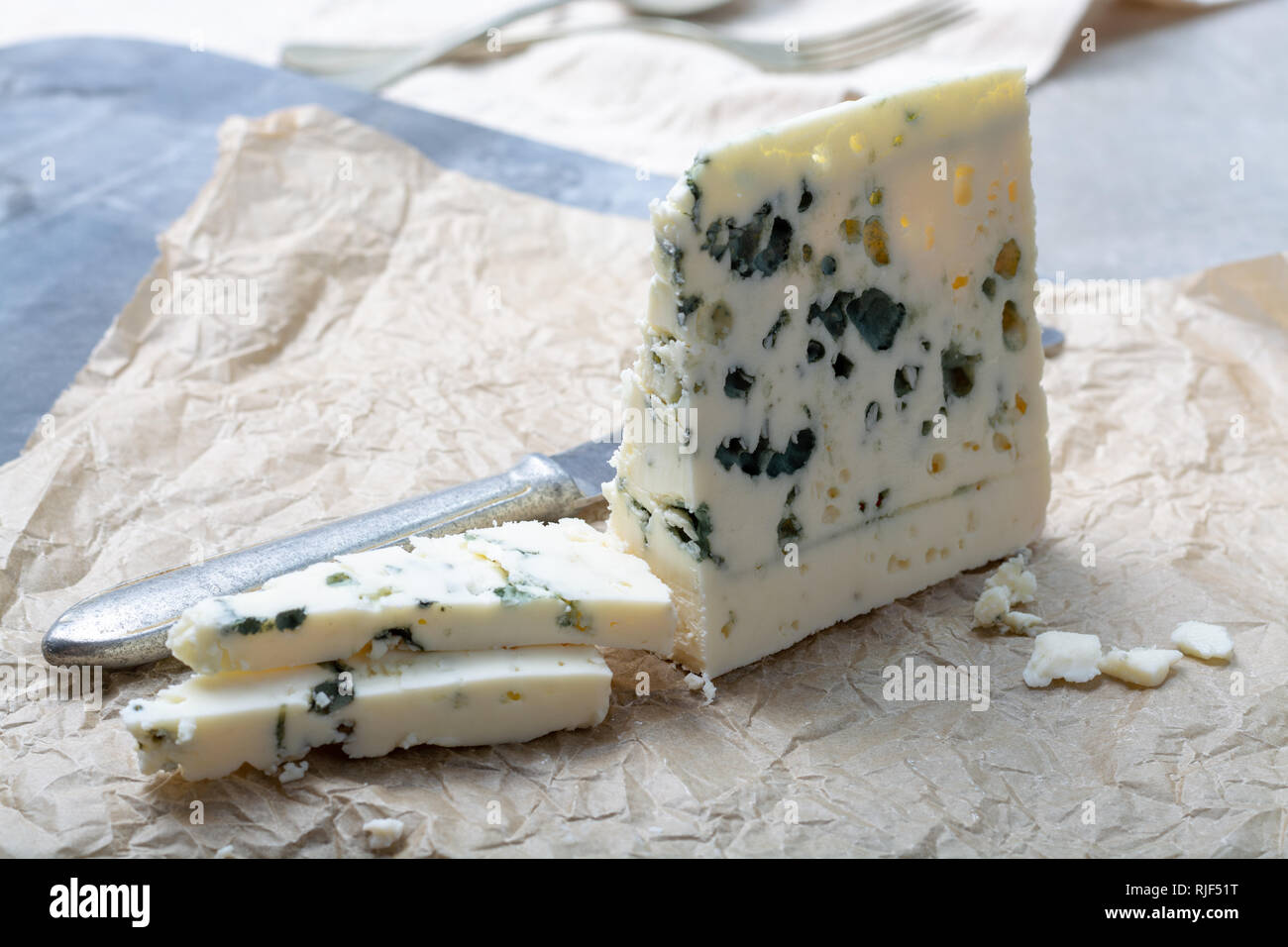 Piece of French blue cheese Roquefort, made from sheep milk in caves of