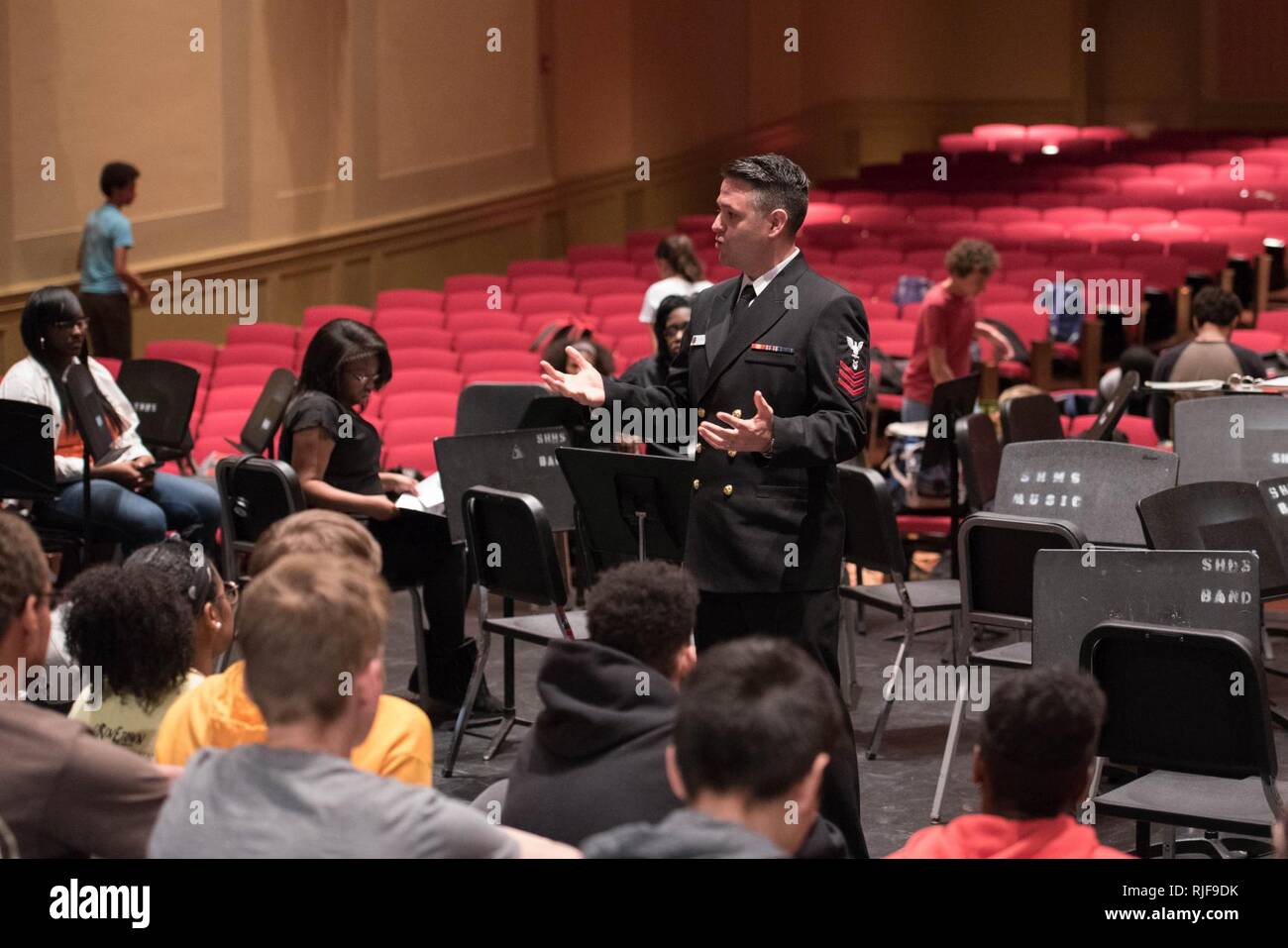 CLEVELAND (April 21, 2017) Musician 1st Class Robert Kurth conducts a masterclass with a choir at Shaker Heights High School. The Sea Chanters are on a 21-day tour of the midwestern United States connecting communities across the United States to their Navy. Stock Photo