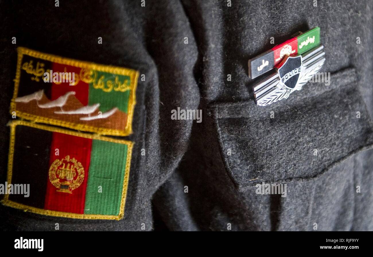 A member of the Afghan Uniformed Police displays the Afghan flag and other insignias as part of his uniform in Zabul province, Afghanistan, Feb. 7.  The AUP acts as mentors to the Afghan Local Police and they work cooperatively to bring security and stability to rural areas of Afghanistan. Stock Photo