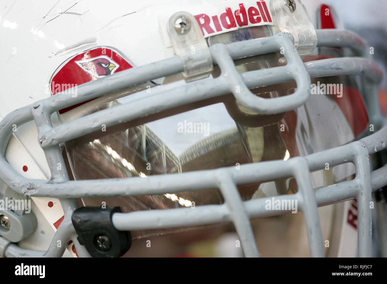 A view inside a football stadium as seen reflected on a players visor