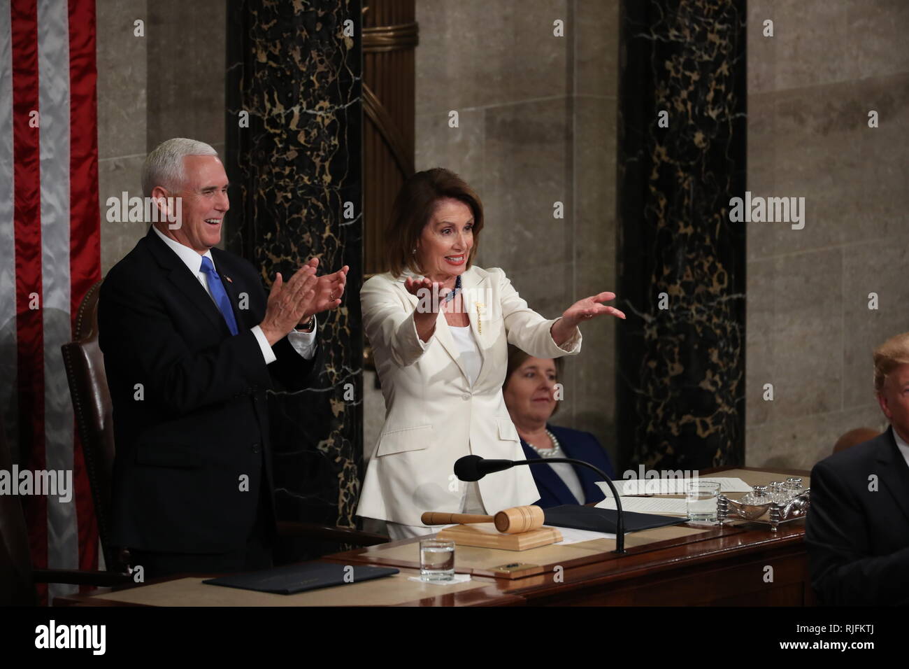 Washington, United States Of America. 05th Feb, 2019. United States Vice President Mike Pence and Speaker of the United States House of Representatives Nancy Pelosi (Democrat of California) applaud as United States President Donald J. Trump finished delivering his second annual State of the Union Address to a joint session of the US Congress in the US Capitol in Washington, DC on Tuesday, February 5, 2019. Credit: Alex Edelman/CNP | usage worldwide Credit: dpa/Alamy Live News Stock Photo