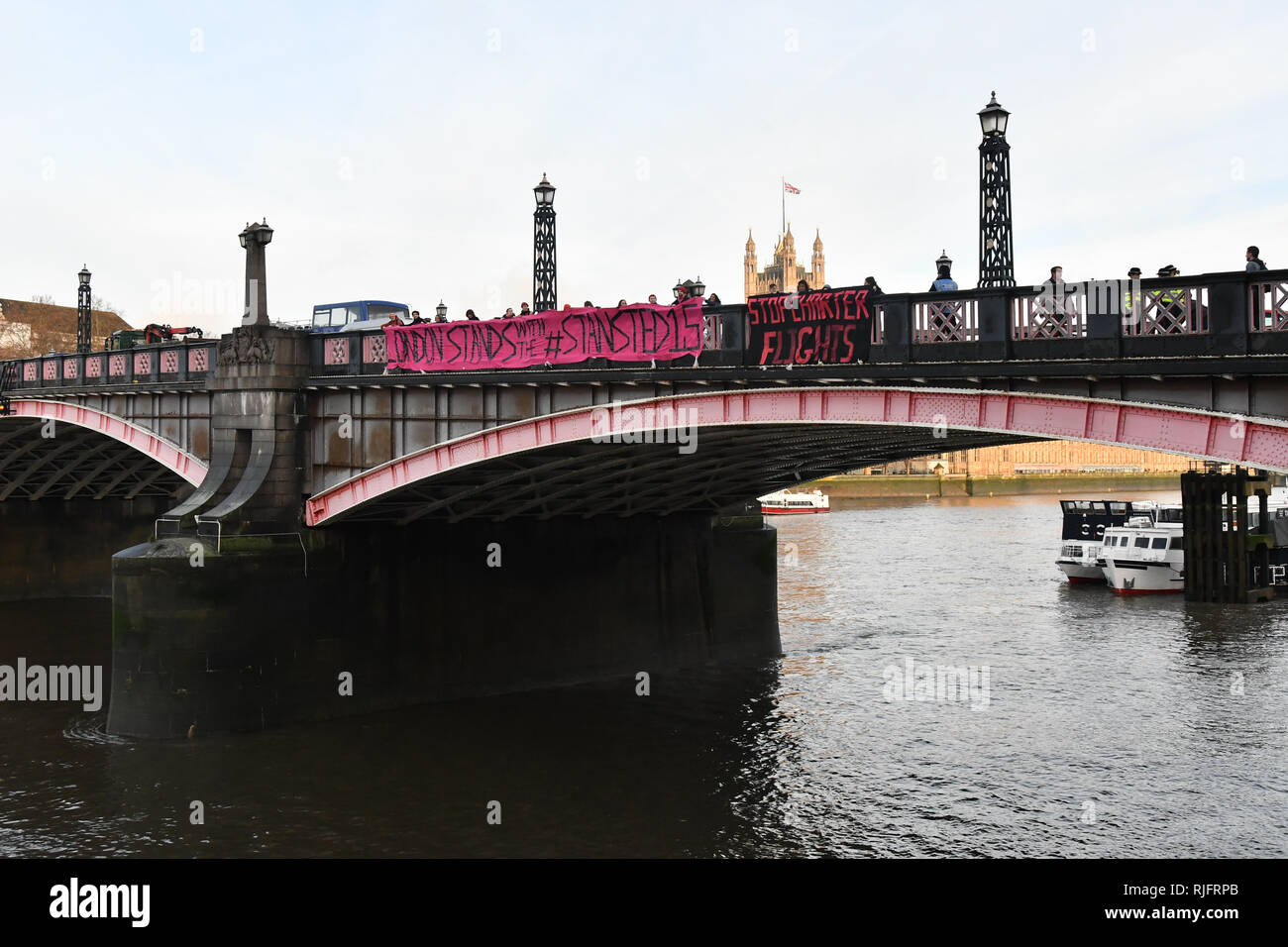 London, UK. 6th February, 2019. Sister Not Cister UK protests demonstration Justice for #Stansted15! Stop the Jamaica Charter Flight! with heavy police present Stop the racist hostile environment drop a banner on Lambeth bridge and march to the Home Office demand to free the #Stansted15 will be Sentencing non-violent peaceful direct action, all of them charged with a terrrorism-related offence that carries a maximum life prison sentence at Chelmsford Crown Court of and Stop deportation, London, UK. 6 Feb 2019. Credit: Picture Capital/Alamy Live News Stock Photo