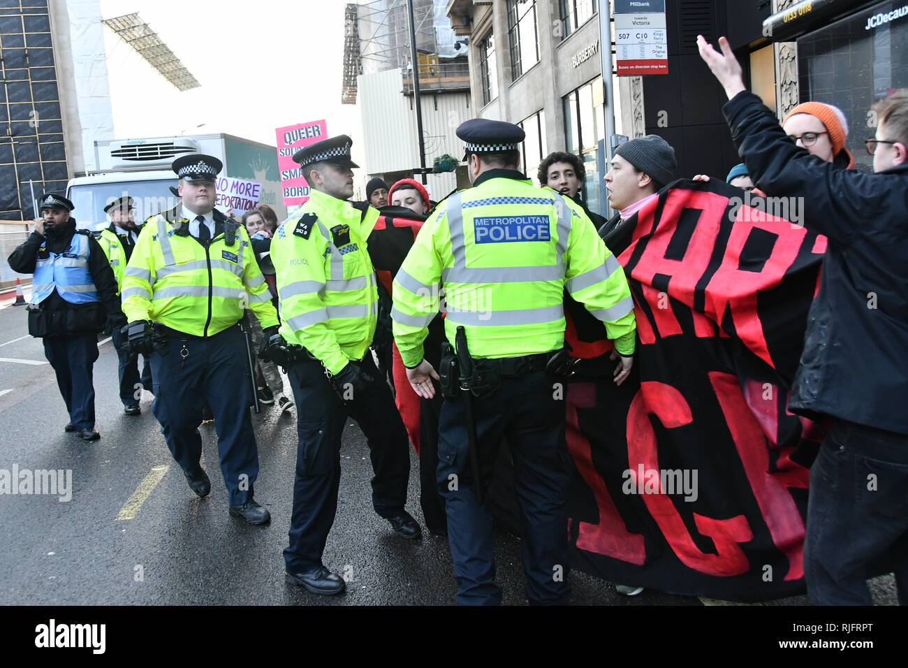 London, UK. 6th February, 2019. Sister Not Cister UK protests demonstration Justice for #Stansted15! Stop the Jamaica Charter Flight! with heavy police present Stop the racist hostile environment drop a banner on Lambeth bridge and march to the Home Office demand to free the #Stansted15 will be Sentencing non-violent peaceful direct action, all of them charged with a terrrorism-related offence that carries a maximum life prison sentence at Chelmsford Crown Court of and Stop deportation, London, UK. 6 Feb 2019. Credit: Picture Capital/Alamy Live News Stock Photo