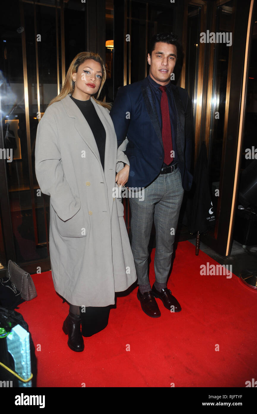 Klara Vernier and Staz Nair attends the Ray Burmiston fundraising exhibition at The Athenaeum Hotel in London. Stock Photo