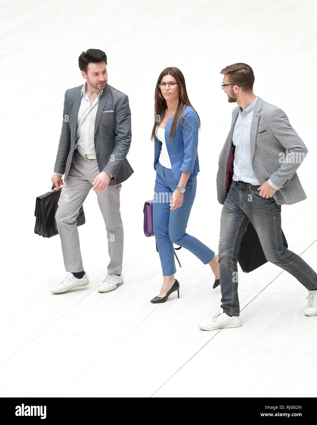 business people walking together Stock Photo - Alamy