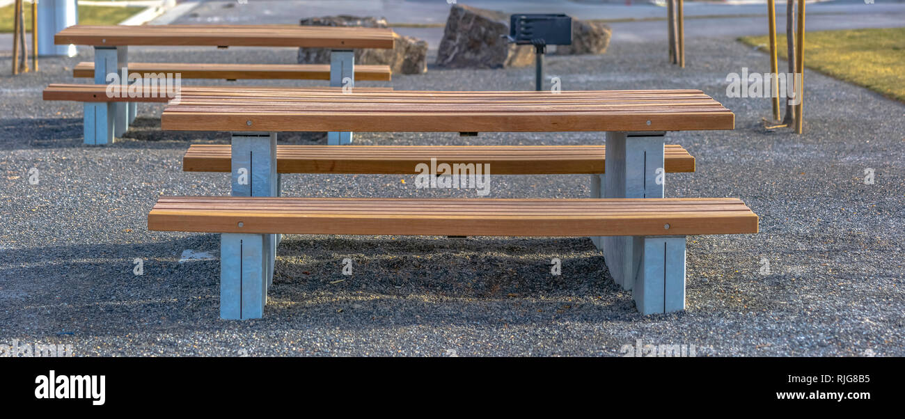 Wooden Tables And Benches On A Sunny Park In Utah Stock Photo