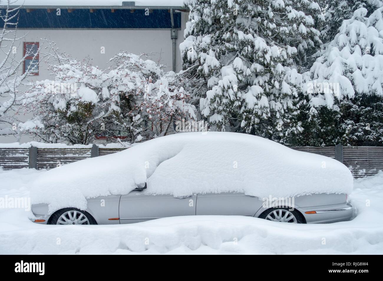 Snowed-in car, Munich, Upper Bavaria, Bavaria, Germany Stock Photo
