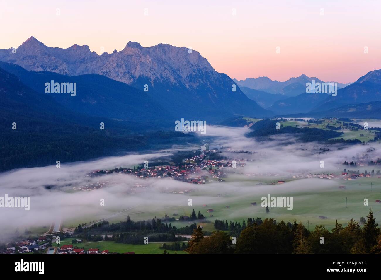 Krün and Isar with Karwendel Mountains, view into the valley with early fog from Krepelschrofen, Werdenfelser Land Stock Photo