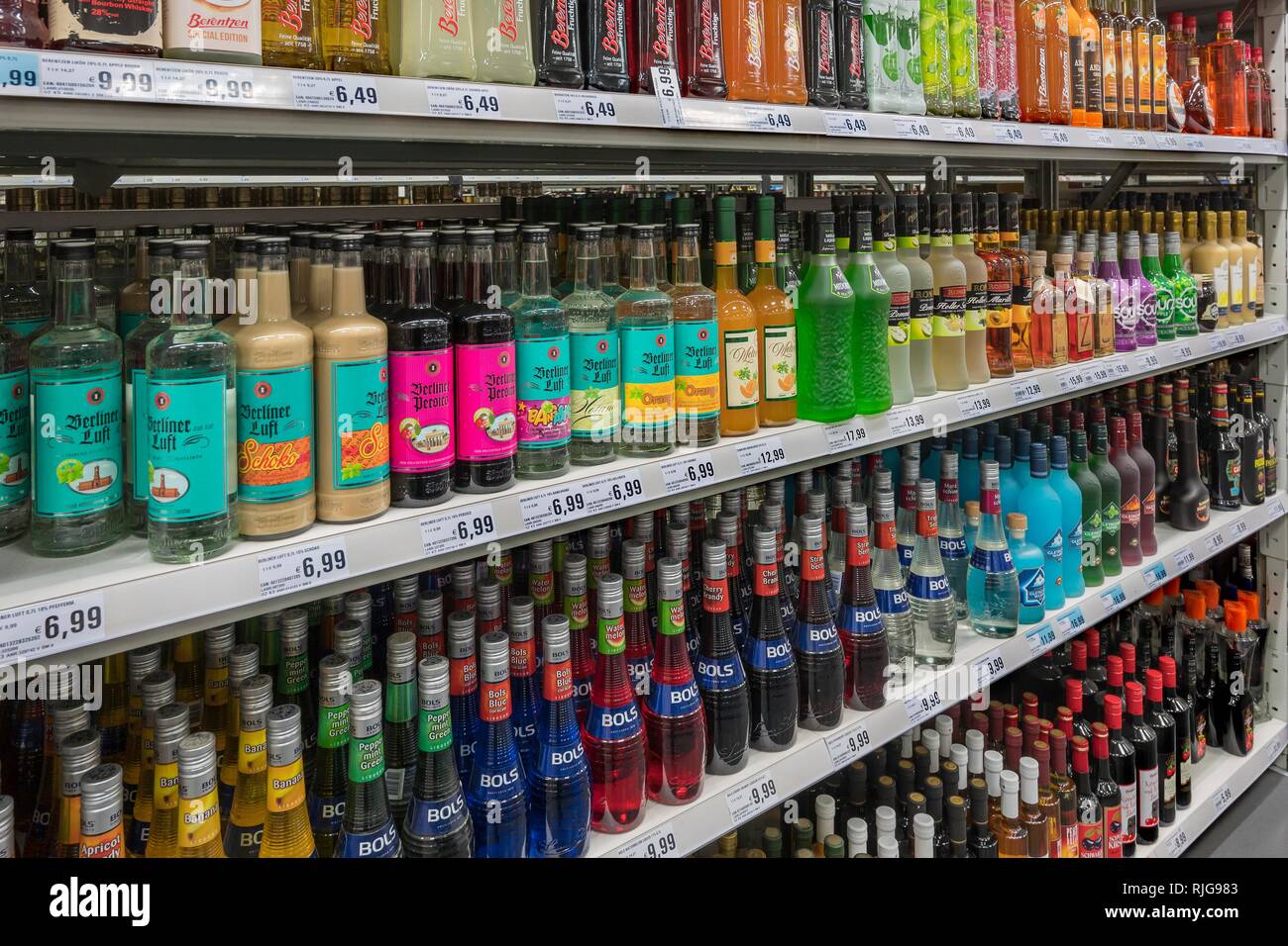 Various spirits on the shelf in supermarkets, Munich, Upper Bavaria, Bavaria, Germany Stock Photo
