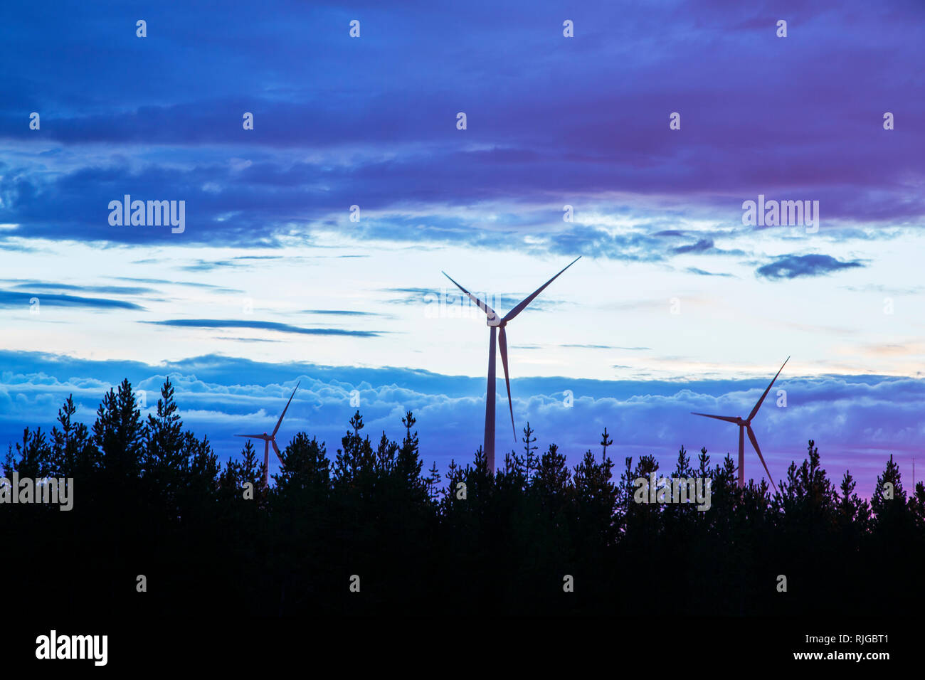 Wind turbines at dusk Stock Photo