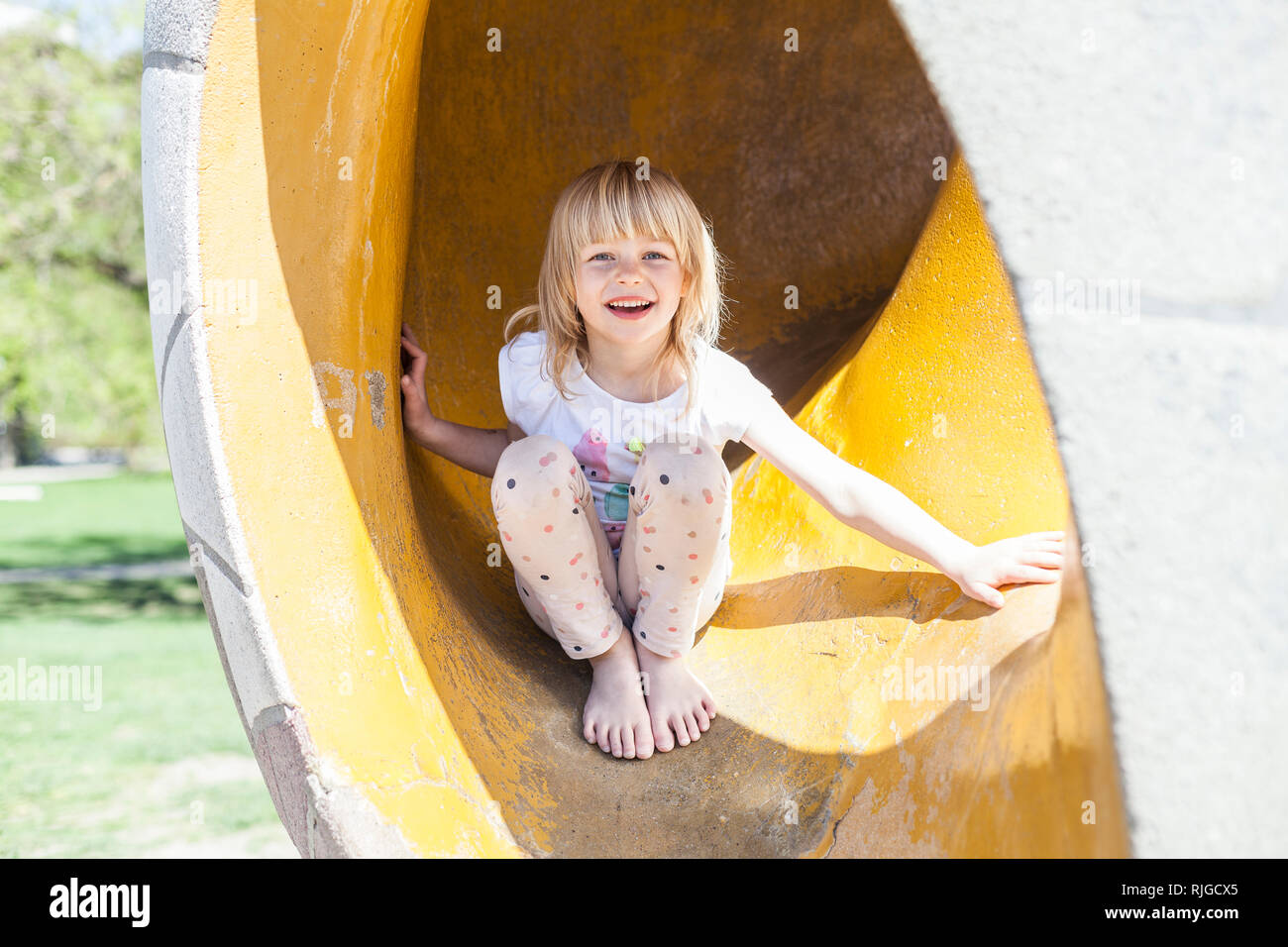 Girl on Slide Stock Photo