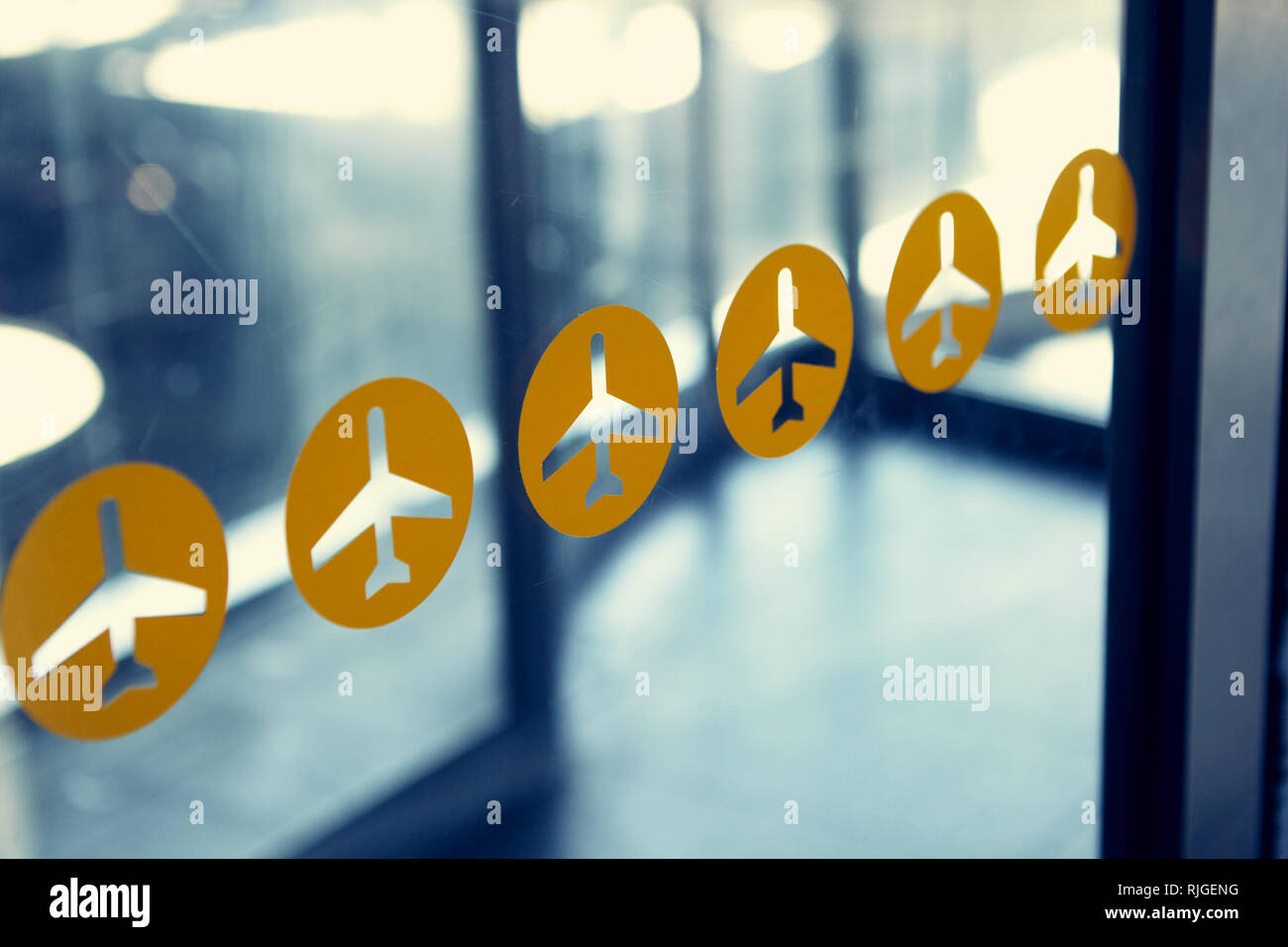 Plane signs on glass, closeup Stock Photo Alamy