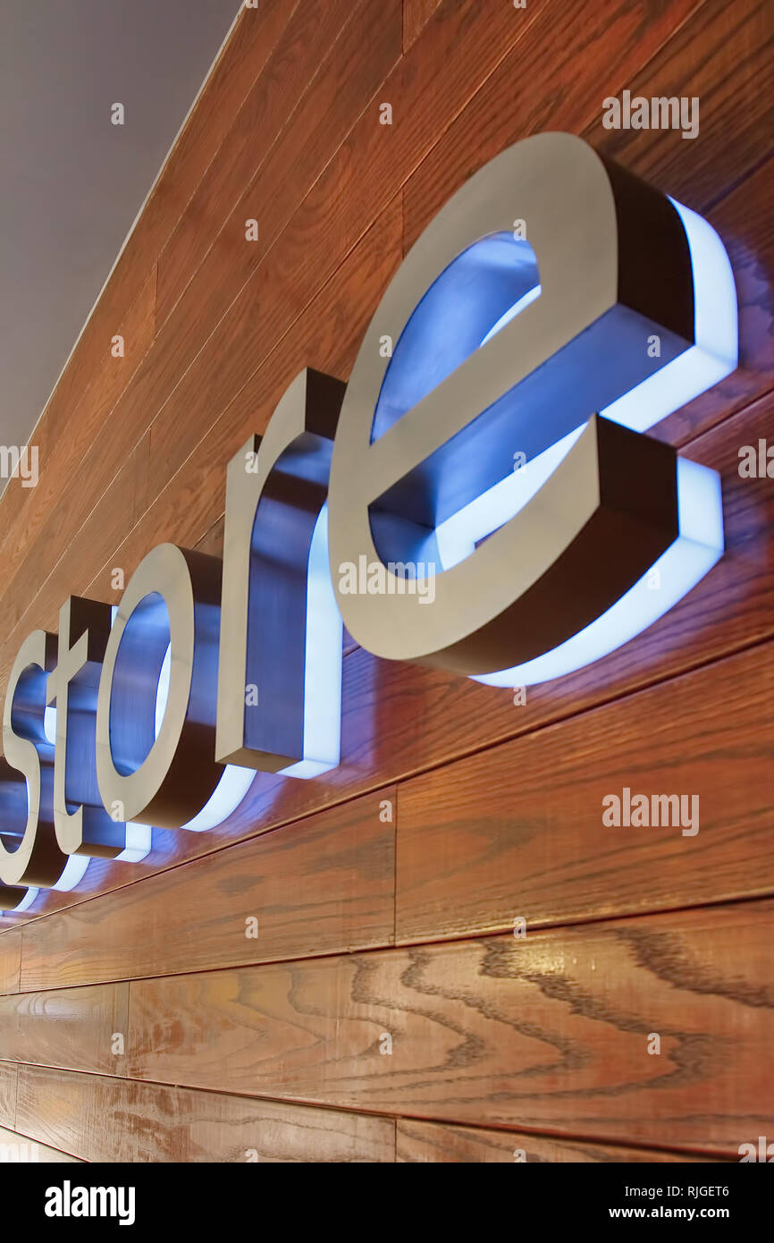 Large lettering on a wooden wall in shopping area Stock Photo - Alamy