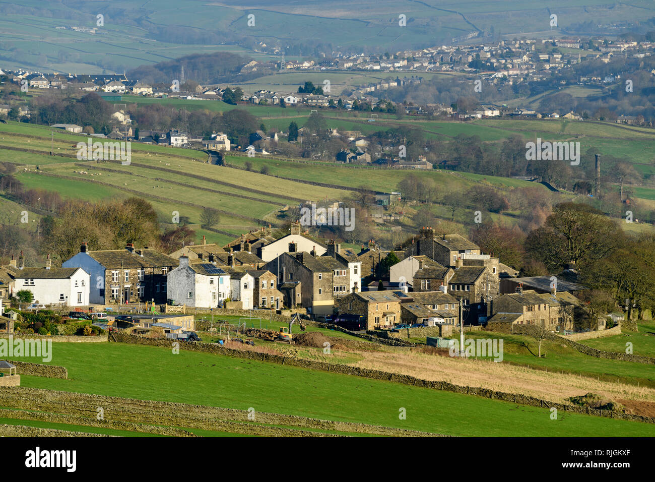 View over Stanbury village (stone cottages & houses in small settlement