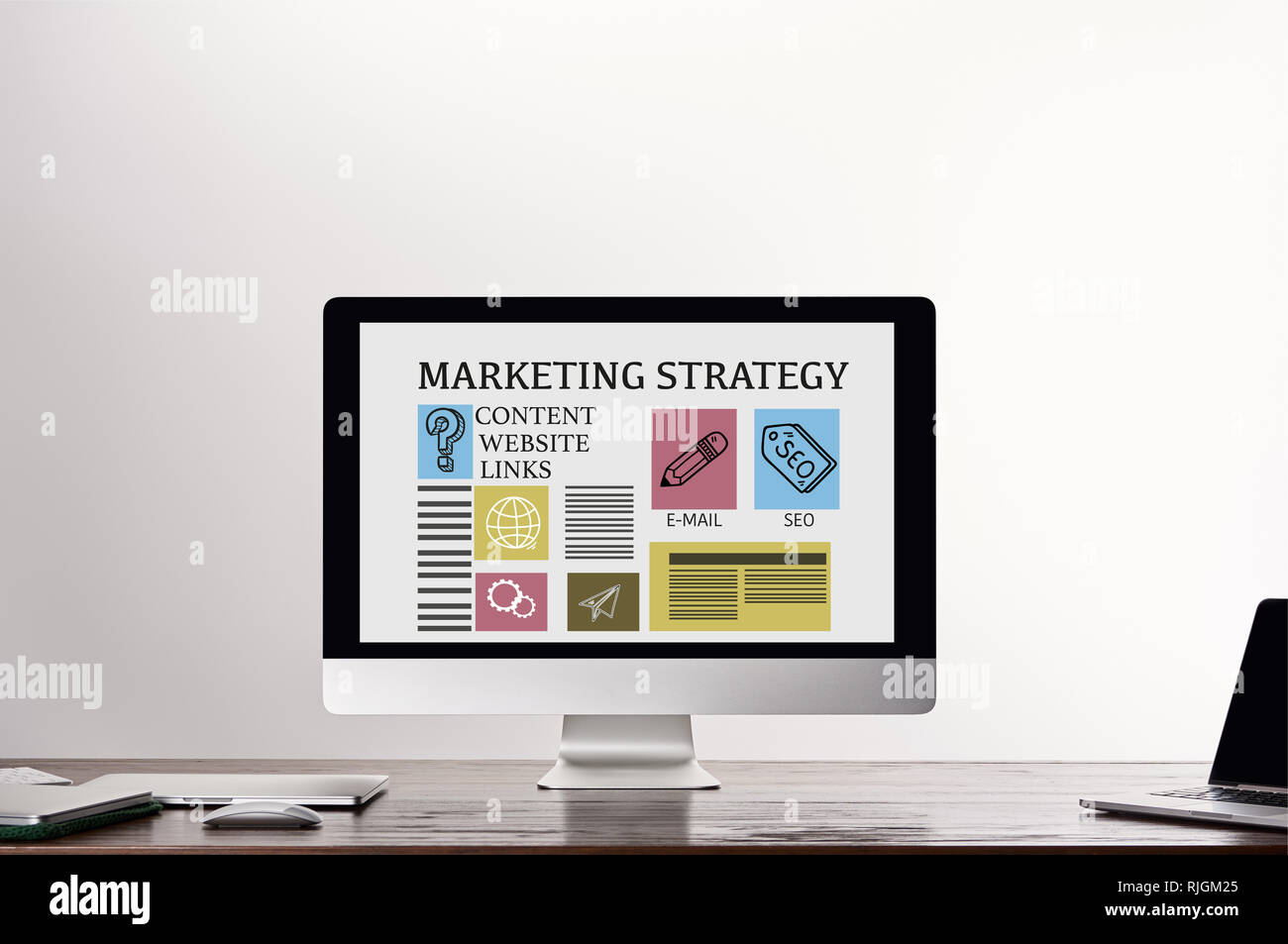 computer with marketing strategy illustration and icons on screen at ...