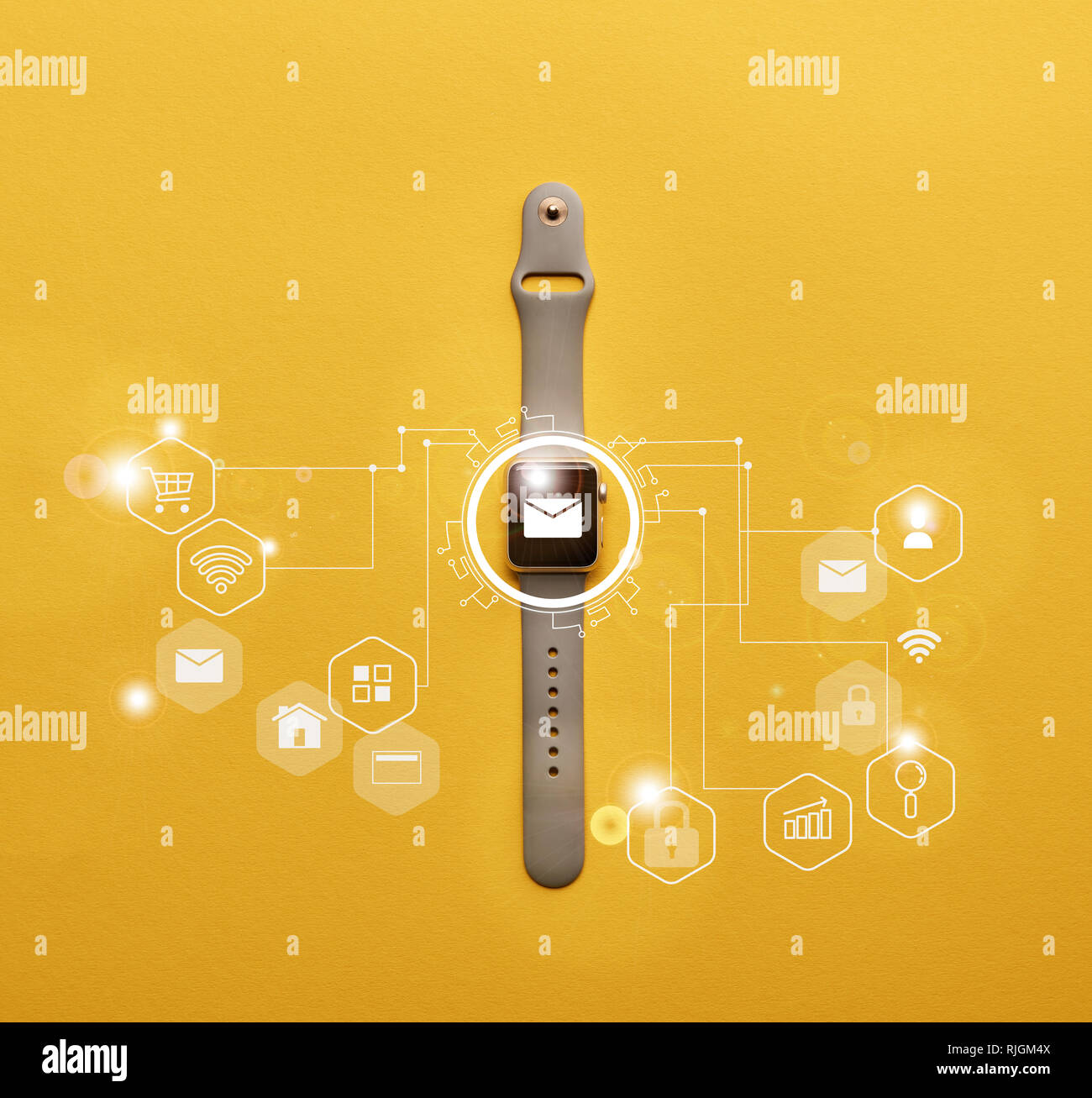 top view of smartwatch with system notification on yellow surface Stock Photo Alamy