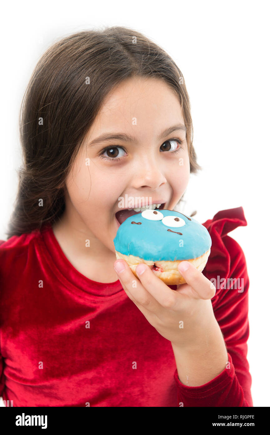 Girl hold glazed donut white background. Kid girl hungry for sweet
