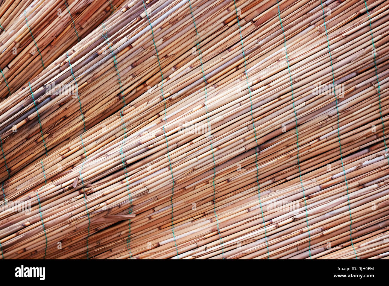 Crinkled bamboo fence texture for background, backdrop use. Stock Photo