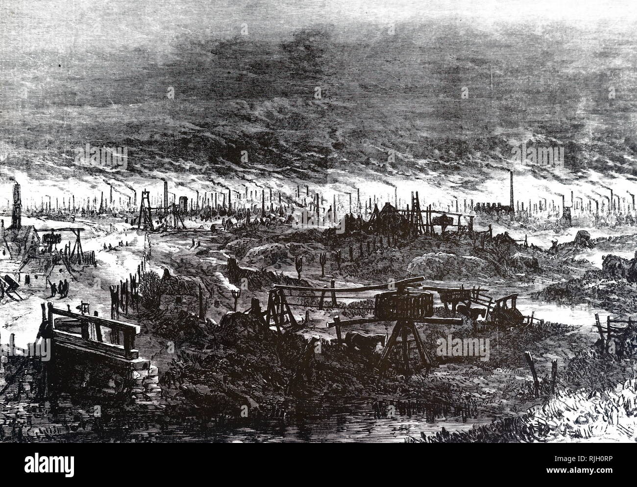 An engraving depicting a view of the 'Black Country' around Wolverhampton. The Black Country is an area of the West Midlands, England. During the Industrial Revolution, it became one of the most industrialised parts of Britain with coal mines, coking, iron foundries, glass factories, brickworks and steel mills producing a high level of air pollution. Dated 19th century Stock Photo