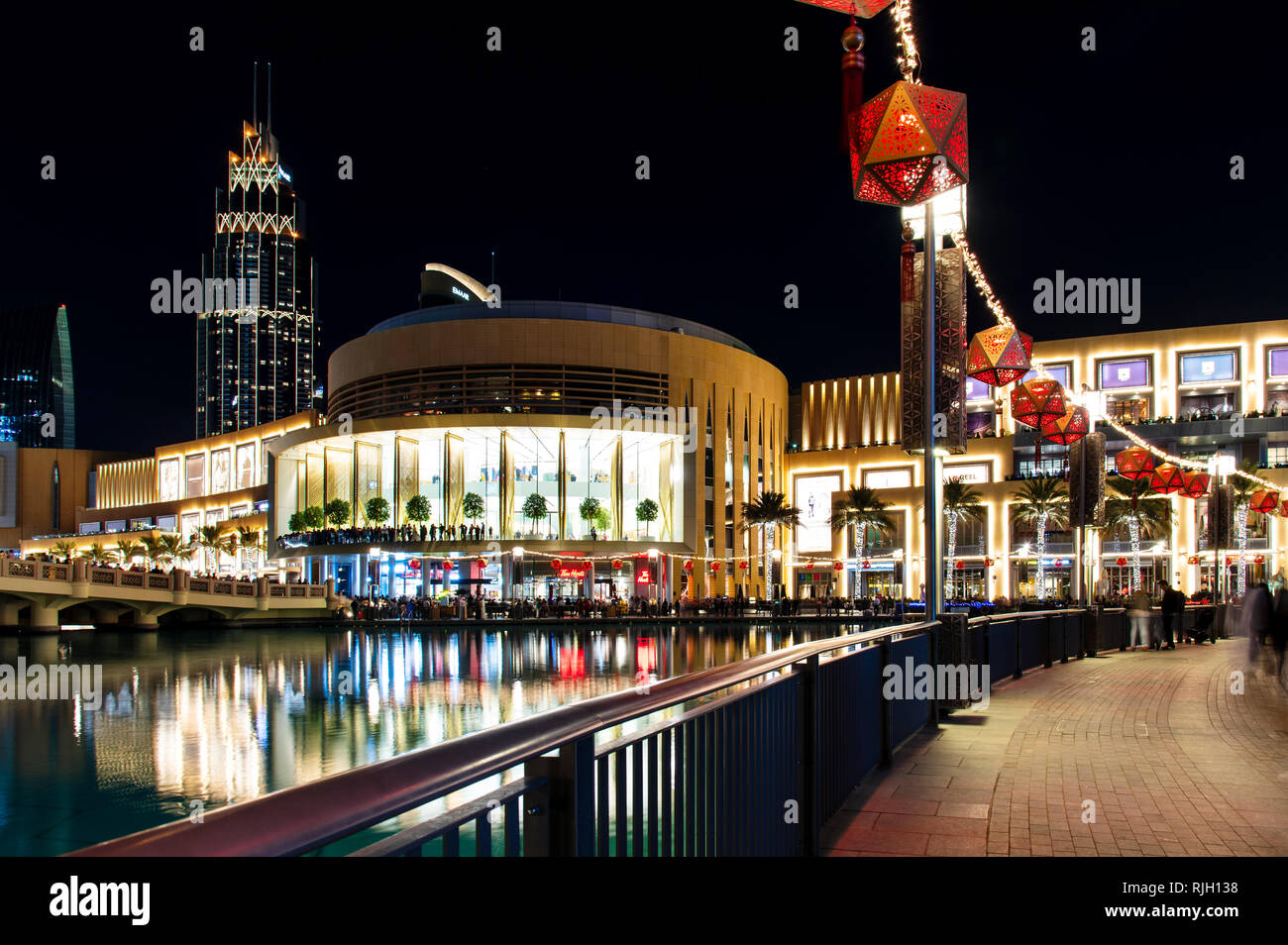 Dubai, United Arab Emirates - February 4, 2018: Dubai mall outdoors walkway with tourists and visitors, beeing one of the main travel attractions in D Stock Photo